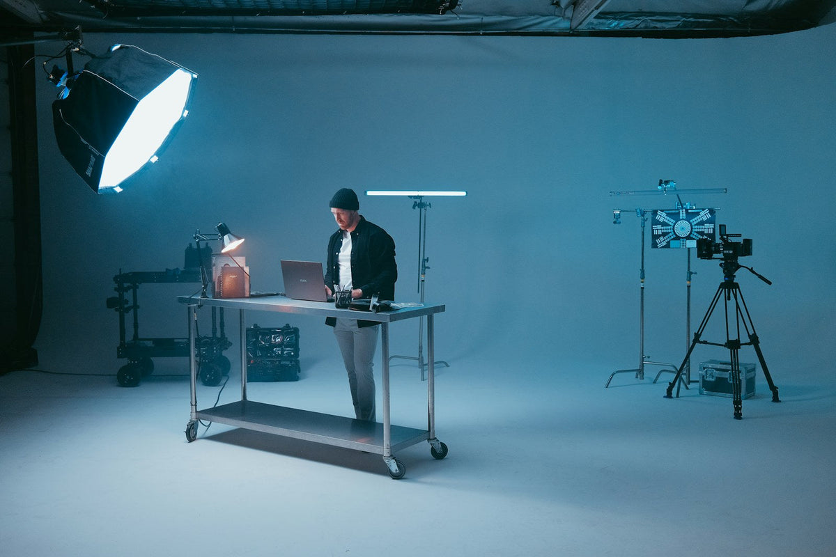 Creative professional working in a camera studio